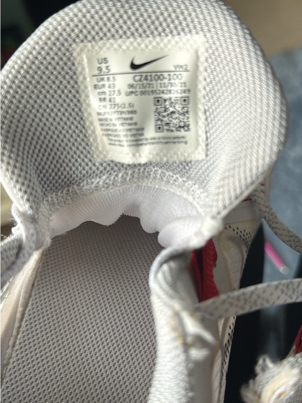 Nike White Sneaker with Red Accents
